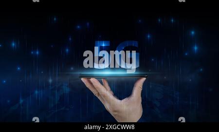 Creative background, male hand holds a phone with 5G hologram on city background. Concept of 5G network, high speed mobile internet, new generation ne Stock Photo