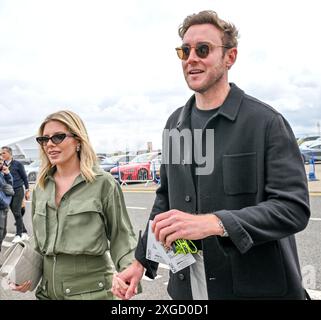 Towcester, UK. 07th July, 2024. Stuart Broad with his wife Mollie King arrive into the Paddock area on Race Day at the Formula 1 Qatar Airways British Grand Prix at Silverstone, Towcester, Northamptonshire, UK. Credit: LFP/Alamy Live News Stock Photo