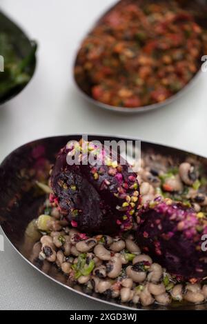 Spicy appetizer. Traditional Turkish and Arabic cuisine meze. Snack meal served alongside the main course. Natural vegetarian food. Bulk appetizer pla Stock Photo