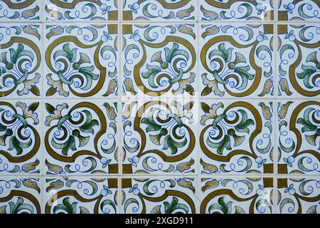 Pattern image of traditional ornate portuguese decorative tiles. Gold and blue azulejos Stock Photo