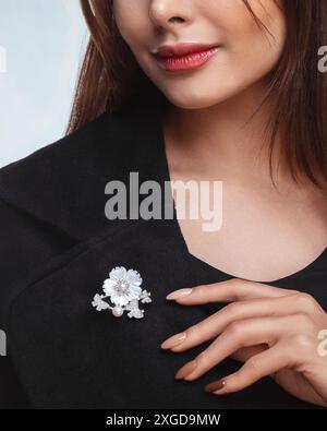 Elegant women's brooch with a floral design, perfect for adding a touch of sophistication Stock Photo
