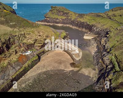 An aerial view of the narrow harbour and surrounding cliffs at Boscastle, on the Atlantic coast of north Cornwall, England, United Kingdom, Europe Stock Photo