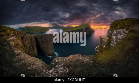 Incredible view of Sorvagsvatn lake on cliffs of Vagar island in sunset ...