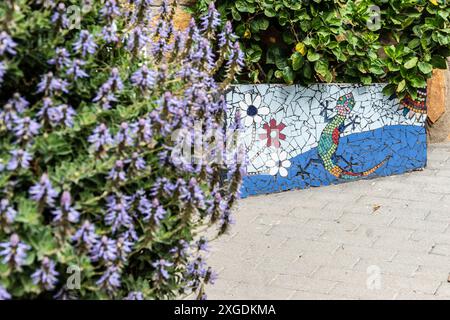 Mosaic planter featuring a chameleon Stock Photo