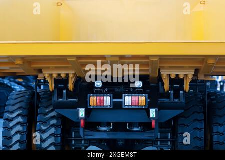 Close-up rear view of a heavy duty dump truck. Selective focus. Stock Photo