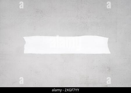 Blank Ripped white paper on gray concrete background to add text. Mock up. Template Stock Photo