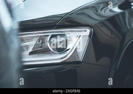 Close up of modern led car headlights, mobility Stock Photo