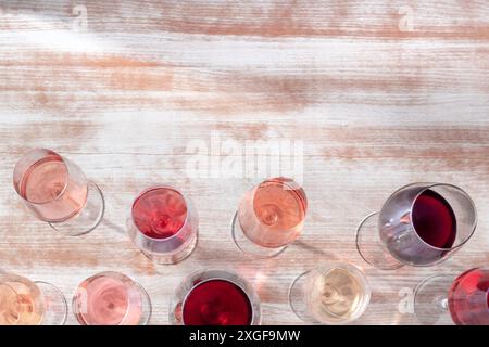 Wine color banner. Various glasses of white, rose, and red wine, shot from the top with copy space Stock Photo
