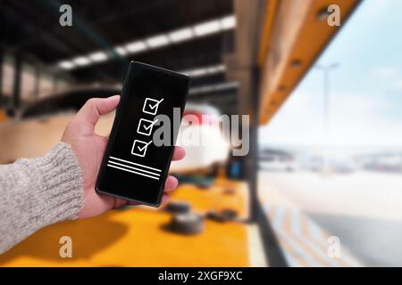 Customers can easily inspect their vehicles repair with a mobile application , Car maintenance concept Stock Photo