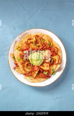 Nachos, Mexican tortilla chips, shot from above with a place for text Stock Photo
