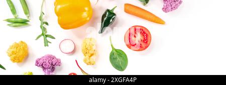 Vegetable panorama with copy space. Various fresh produce, shot from the top on a white background. Healthy summer salad ingredients Stock Photo