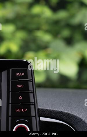 Closeup of the buttons on a cars entertainment system on the inside Stock Photo