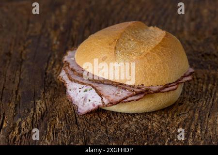 Bavarian meat loaf bun on wood Stock Photo
