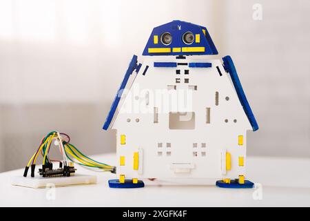 White and Blue Robot Kit With Ultrasonic Sensor and Wires Stock Photo