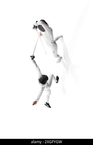 Poster. Fencers' swords meet in practice session, with both athletes focusing on their form against white studio background. Aerial view. Stock Photo