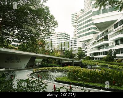 Sinngapore city, Singapore - 16th march, 2023: The Interlace Condominium in Singapore time-lapse panorama. Eco friendly and sustainable buildings Asia Stock Photo