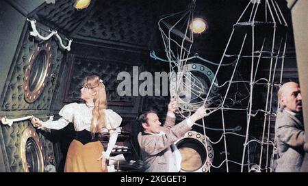 FIRST MEN IN THE MOON 1964 Columbia Pictures film with from left :  Martha Hyer, Edward Judd and Lionel Jeffries Stock Photo