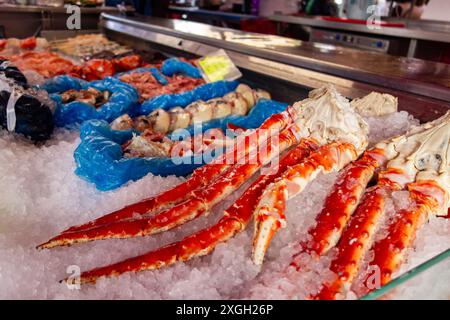 Legs of king crab (paralithodes camtschaticus) on ice in shop in Norway Stock Photo