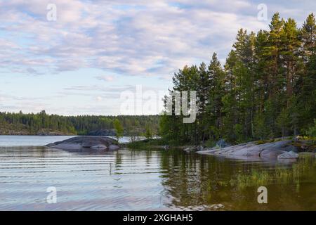 June evening near the Koyonsaari island. Ladoga lake. Karelia, Russia Stock Photo