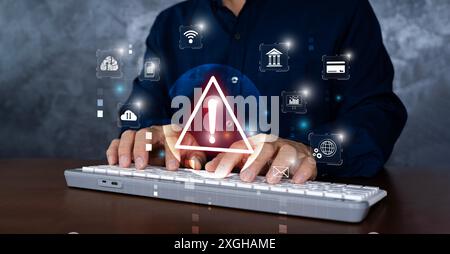 Triangle caution warning sing on laptop screen and Businessman using. Problem for notification error 404 and maintenance service alarm or beware hazar Stock Photo