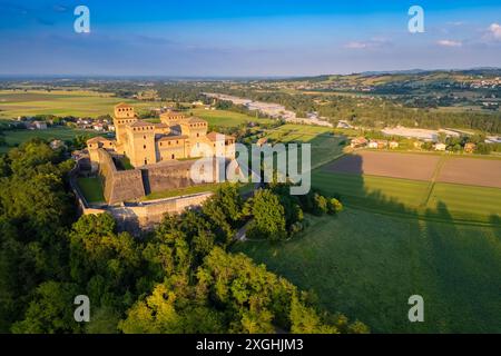 Aerial view of castle of Torrechiara during a summer sunset. Langhirano, Parma province, Emilia Romagna, Italy, Europe. Stock Photo