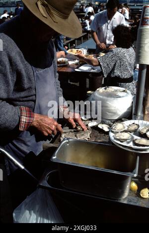 San Pedro CA USA 1983.  San Pedro wharf with fish market, boutique shops, outdoor sea food dining. Stock Photo