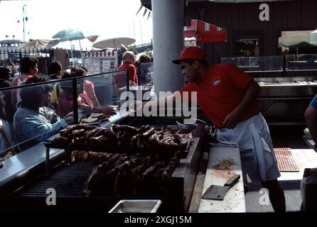 San Pedro CA USA 1983.  San Pedro wharf with fish market, boutique shops, outdoor sea food dining. Stock Photo