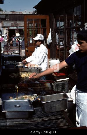 San Pedro CA USA 1983.  San Pedro wharf with fish market, boutique shops, outdoor sea food dining. Stock Photo