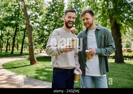 Two bearded gay men are laughing together in a park Stock Photo - Alamy
