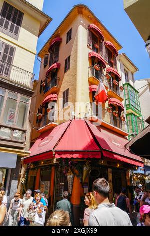 Palma de Mallorca, Spain- May 24, 2024: Beautiful street scene, medieval architecture of Palma Stock Photo