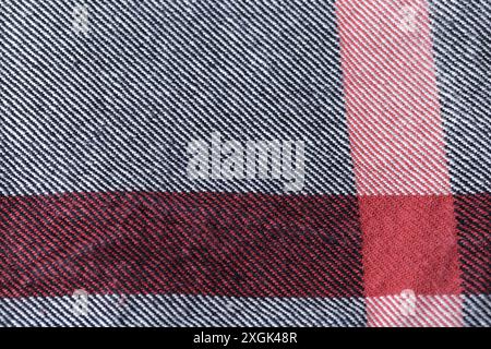 Gray and red kitchen cloth textile texture. Angle on one side. Stock Photo