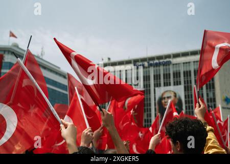 Izmir, Turkey - May 19 2024: Young athletes marching with Turkish flags during the Youth and Sports Day and Ataturk Memorial Day celebrations at Repub Stock Photo