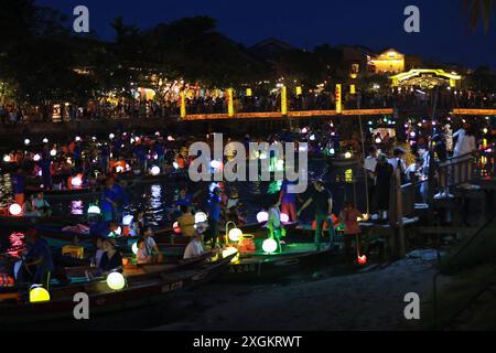 Hoi An, Vietnam July 7 2024: the lantern boats on the thu bon river in hoi a night market in vietnam. night life of Hoi An is busy Stock Photo