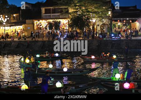 Hoi An, Vietnam July 7 2024: the lantern boats on the thu bon river in hoi a night market in vietnam. night life of Hoi An is busy Stock Photo