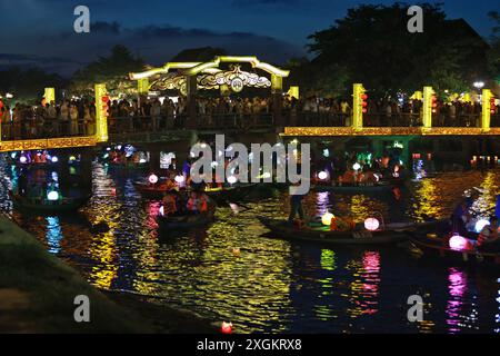 Hoi An, Vietnam July 7 2024: the lantern boats on the thu bon river in hoi a night market in vietnam. night life of Hoi An is busy Stock Photo