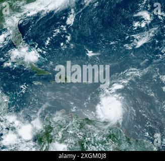 Satellite image of Hurricane Beryl over Grenada in the Caribbean Sea on 1st July 2024. Beryl made landfall on the island of Carriacou, Grenada, on the afternoon of the 1st as a category 4 storm with sustained winds of 240 kilometres per hour. The storm caused extensive damage and five deaths. On the 2nd July Beryl peaked as a category 5 hurricane, the earliest in the Atlantic hurricane season that a hurricane has reached category 5 since records began. Image obtained by the Geostationary Operational Environmental Satellite 16 (GOES-16). Stock Photo