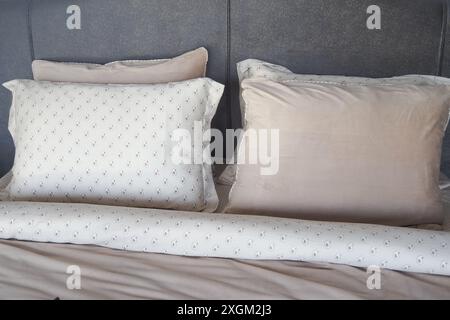 white pillow lined up on bed  Stock Photo