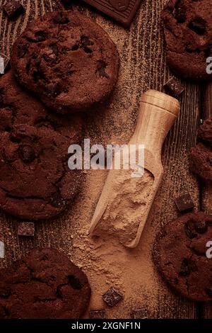 Dark chocolate cookies, with chocolate chips, on a wooden table, selective focus, close-up, no people, toned Stock Photo