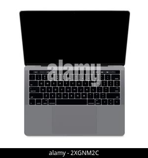 A silver laptop with a black screen and black keyboard, viewed from above Stock Photo