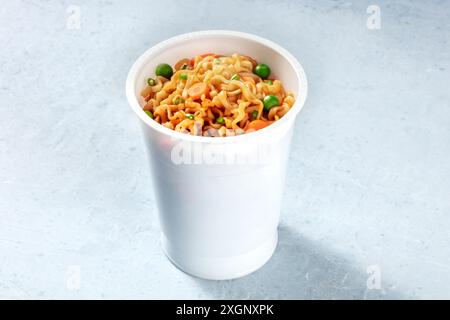 Ramen cup. Instant noodles with vegetables, Asian fast food Stock Photo
