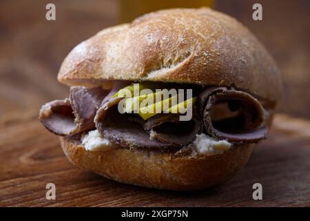 Cold roast pork in a roll Stock Photo