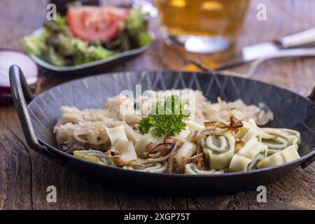 Maultaschen in a pan Stock Photo
