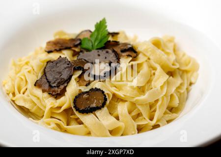 Black truffle on home made pasta Stock Photo