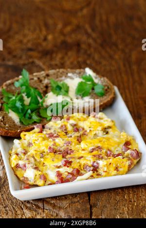 Scrambled eggs on a white plate Stock Photo