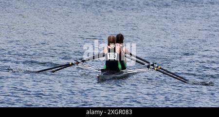 Ladies Pairs Sculling Team Rowing on River. Stock Photo