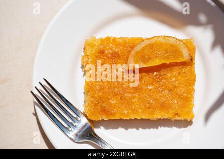 Authentic Greek Orange Pie. This is a Greek specialty known as Portokalopita. Its made with phyllo pastry and soaked in an orange syrup Stock Photo