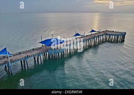 Aerial view of a pier on the Atlantic Coast of Florida Stock Photo