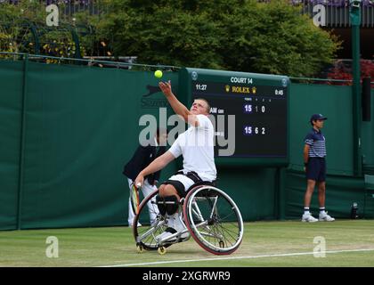 Wimbledon, UK, 10th July 2024; All England Lawn Tennis and Croquet Club, London, England; Wimbledon Tennis Tournament, Day 10; Ben Bartram (GBR) serves to Alfie Hewett (GBR), mens wheelchair singles first round match Stock Photo