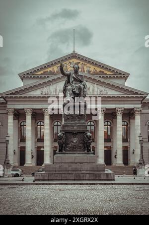 Munich, Germany - Dec 21, 2023 - Monument Bronze Statue of King Maximilian I Joseph of Bavaria in front of The National Theatre of Munich (Nationalthe Stock Photo