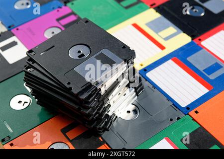 A Stack of vintage floppy disks. Old technologies. Selective focus. Low DOF Stock Photo